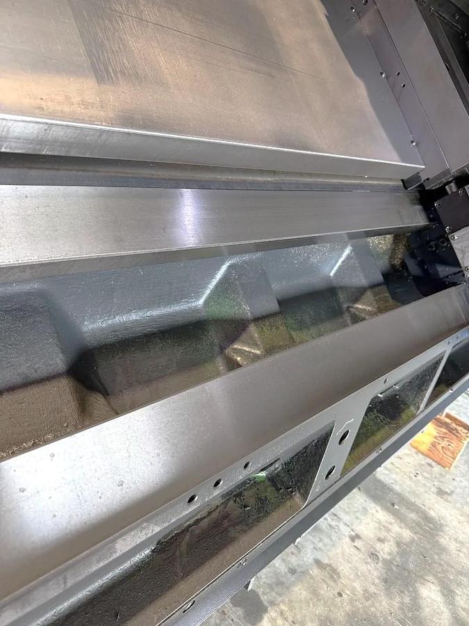 Used 2012 Doosan Puma 400MB with C Axis, Milling Capable, 15" Hyd. Chk, 4.5" Bar Cap., 41.3" cc, Tailstock, Conveyor, Live Tooling