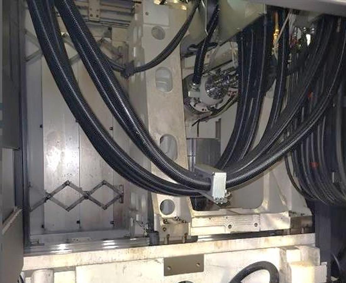 Used 2017 Okuma MB-4000H with 6 Station Rotary Pallet Changer, Full 4th Axis Rotary Tbl, 15k RPM, HSK63 Tpr., HPC, Probing, 64 Pos ATC