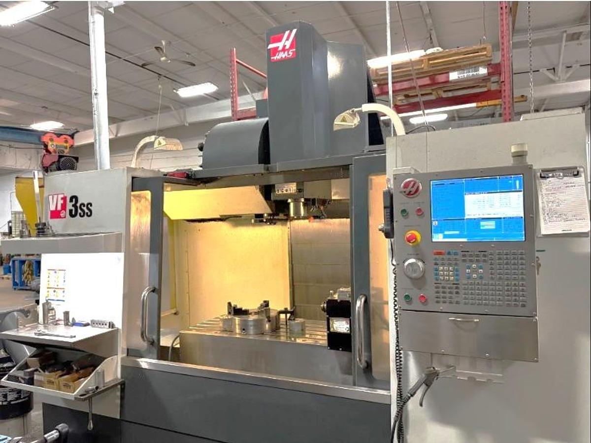 Used 2012 Haas VF-3SS with 4th Axis Rotary Table, Chip Auger, RJH, 24 Station Side Mounted ATC, 12,000 RPM