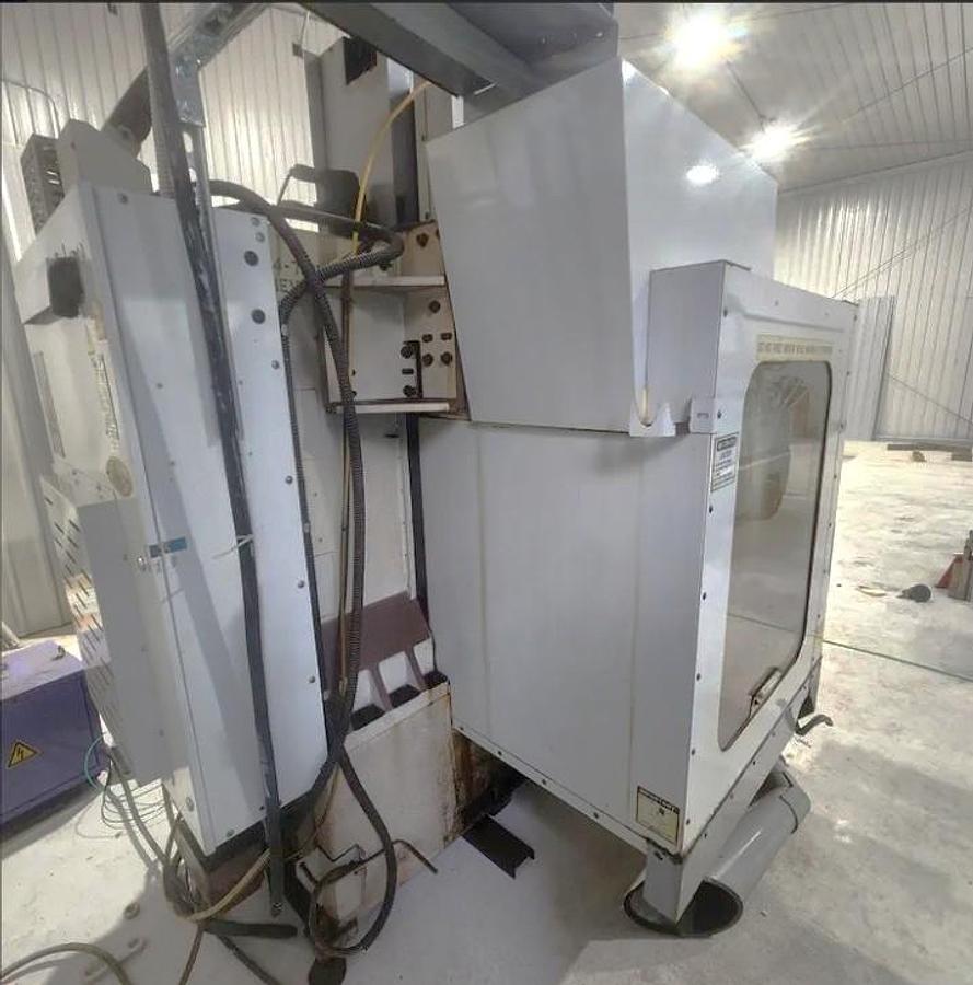 Used 2001 Haas VF2 with 4th Axis Drive, Programmable Coolant, Chip Auger, USB Emulator, Rigid Tapping, 24 Station Side Mounted ATC