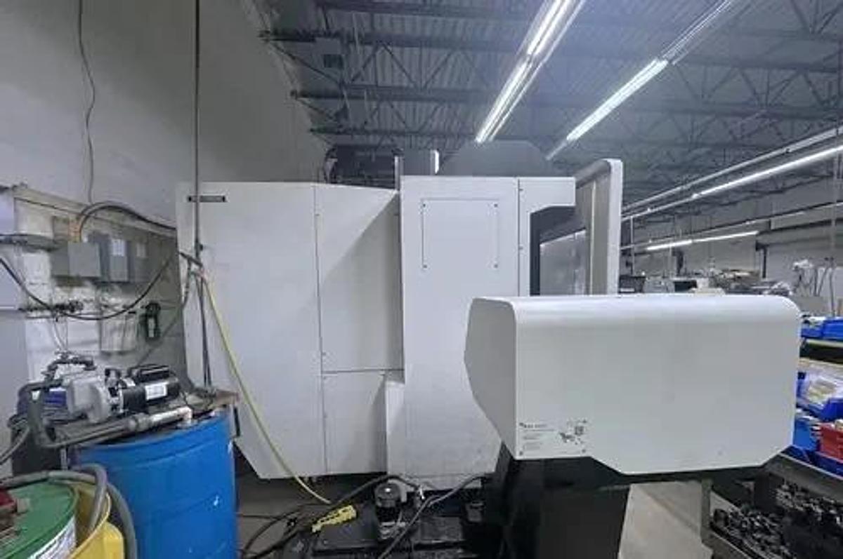 Used 2017 DMG Mori CMX 1100V  with 4th Axis Rotary Table, 12,000 RPM, Chip Conveyor, 30 Station Side Mount ATC
