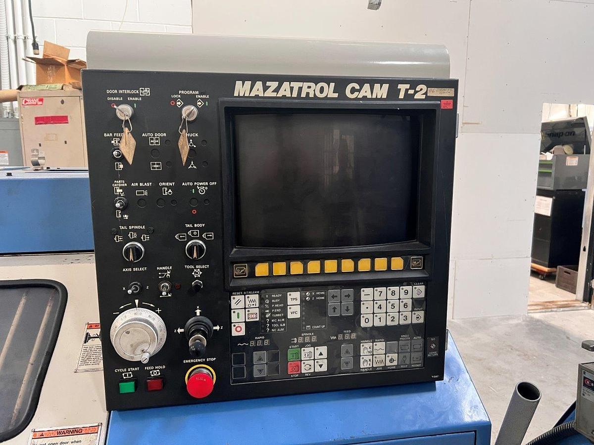 Used 1988 Mazak QT15 Universal with Mazatrol T-2 Control, 8" Chuck, 2" Bar Capacity, Chip Conveyor, Tool Presetter, Tailstock