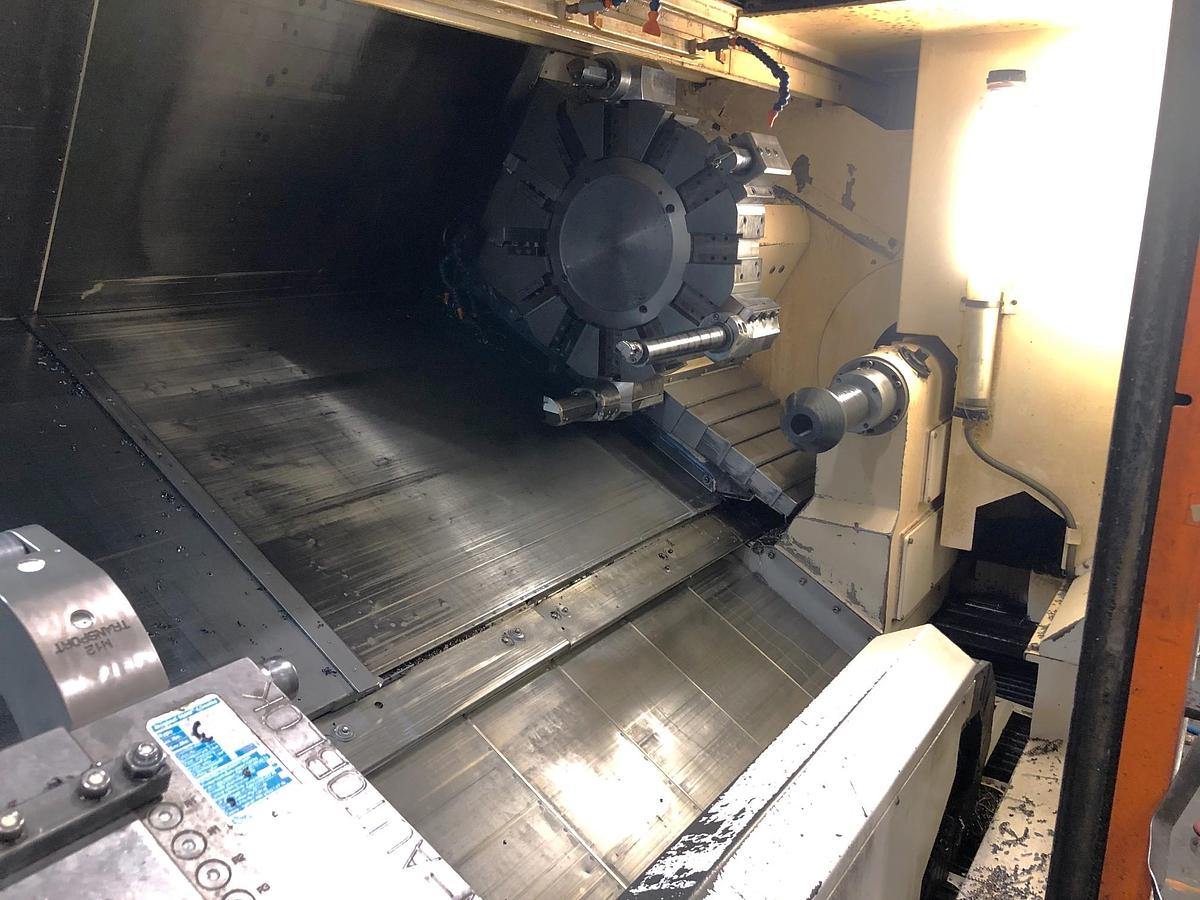Used 2012 Mazak Nexus QTN 450-II/2000 with 7.24" Bore, 6.5" Bar Capacity, Hydr. Steady Rest, 19.7" Hyd Chuck, Tailstock, Chip Conveyor