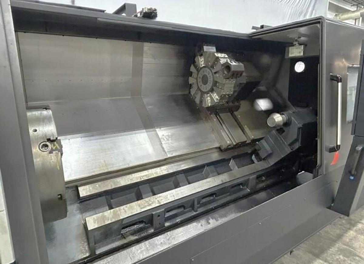 Used 2022 DN Solutions Puma 5100LC with 24.75" 4 Jaw Hyd. Chuck, 10.5" Spindle Bore, 82" Turn Length, Chip Conveyor, Tailstock