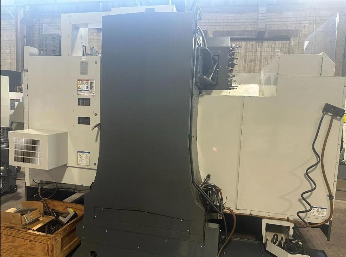 Used 2014 Haas VF8/40 with Haas Probing Package (needs probe repaired), 24 Station Side Mount ATC, 8100 RPM, CAT 40
