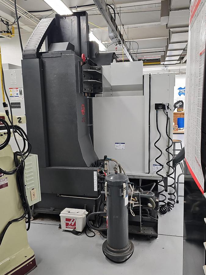 Used 2013 Haas VF-4SS w/Wired for 4th/5th axis, Remote Jog Handle, WIPS Renishaw Tool & Part Probe, Programmable Coolant Nozzle