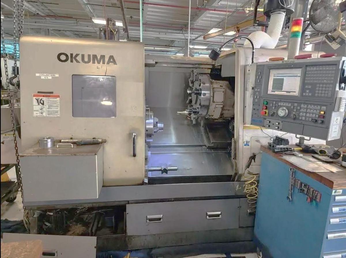 Used 2005 Okuma Captain L470M with C Axis, Milling Capability, 12" Hyd. Chuck, Tailstock, Tool Presetter, Chip Conveyor