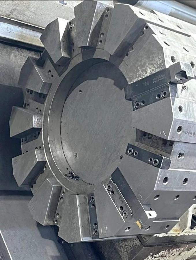 Used 2012 Chevalier FBL-530C with 12.59" Bore, 32" 4 Jaw Manual Front Chk, 28" Rear Air Chk, Tailstock, 118" cc, 500 RPM, Conveyor 