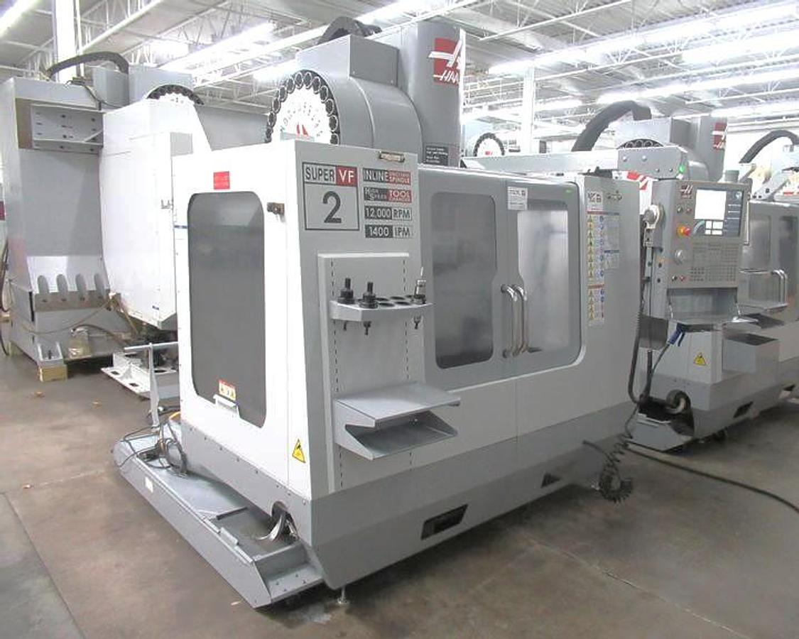 Used 2007 Haas VF2SS with Probing, Chip Auger, Progr. Coolant Nozzle, 24 Station SMATC, Jog Handle, Stevens Fixture Plate