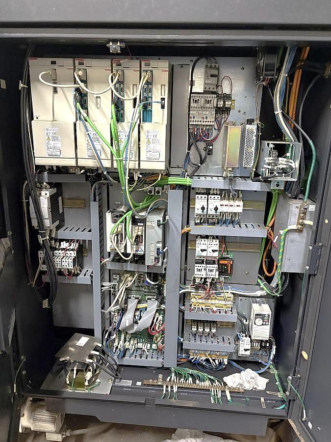 Used 2005 Mazak Nexus VCN 510C Chip Conveyor, Remote Jog Handle, Misc Tooling