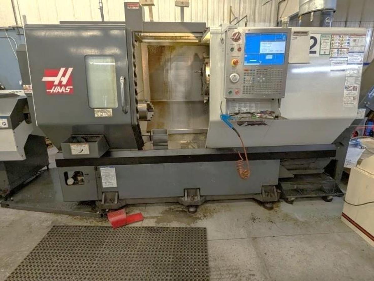 Used 2011 Haas ST-30M Chucker with Haas Barfeed, Chip Conveyor, Parts Catcher, Live Tooling, 3" Bar Cap., 10" Chuck, (5) Live Holders