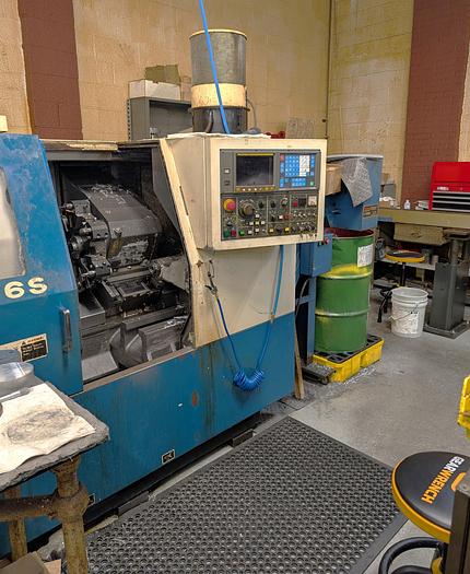 Used 1996 Daewoo Puma 6S wioth Tailstock, Chip Conveyor, Tool Presetter, Fanuc OT Control