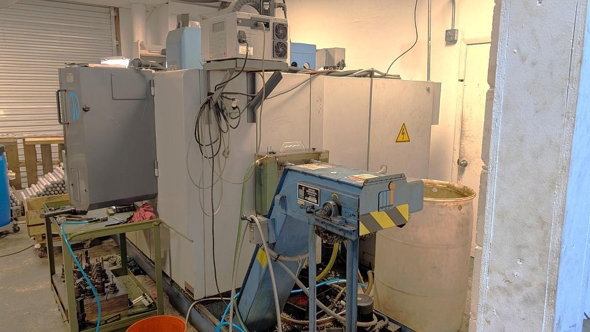 Used 1998 Mazak VTC16B with Yuasa Indexer, Chip Conveyor, Auto Tool Length Measurement Probe, Making Parts