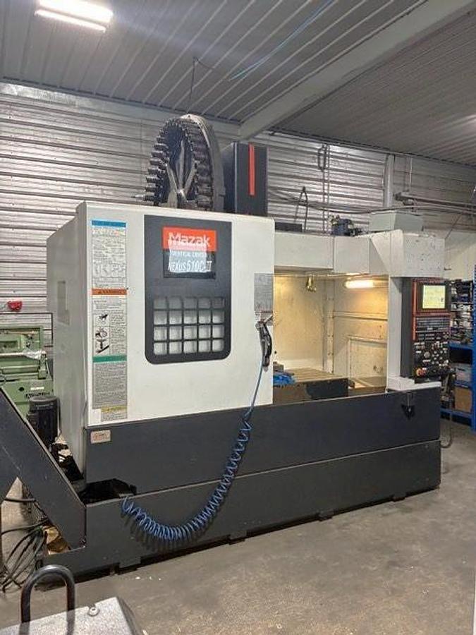 Used 2009 Mazak Nexus VCN 510C/40 II with Chip Conveyor, 48 Station Side Mounted ATC, CAT 40, 12,000 RPM, ONLY 2,201 CUT HOURS!!