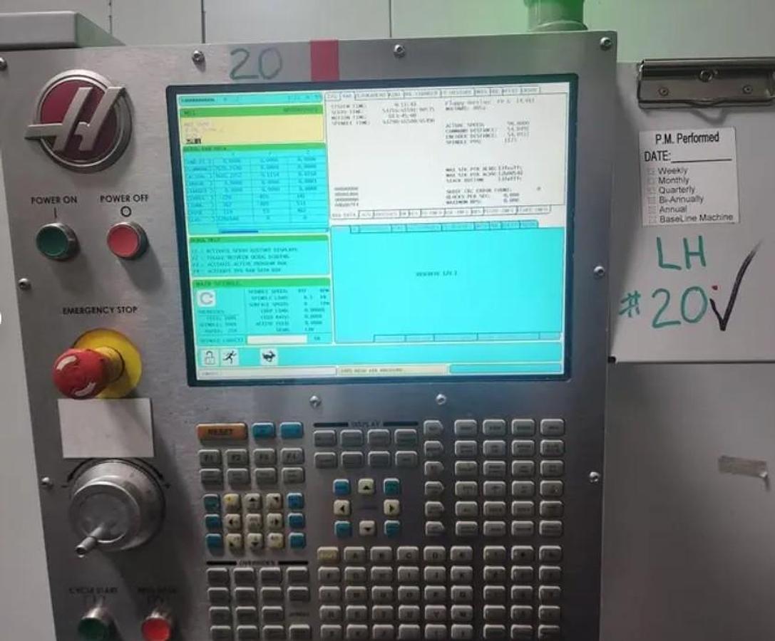 Used 2014 Haas VF-12/40 with Haas HRT-310 4th Axis Rotary Table