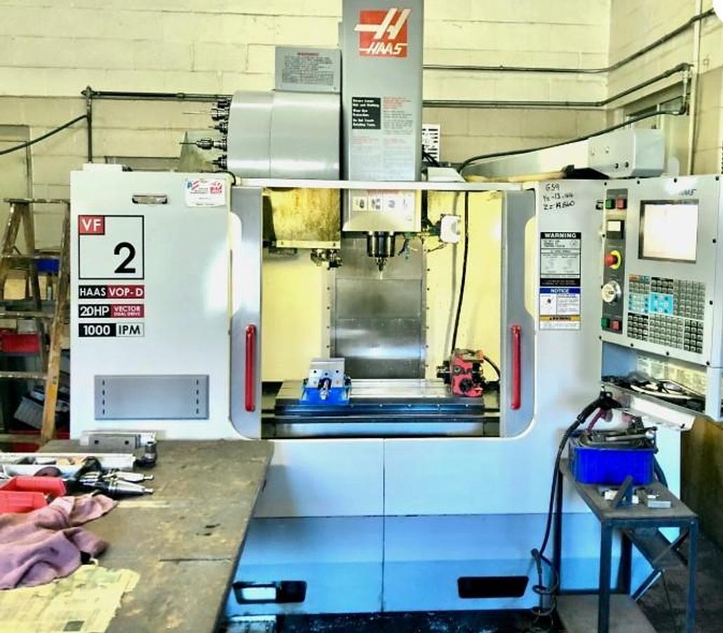 Used 2004 Haas VF2D with 4th Axis Drive, 24 Station Side Mount ATC, Chip uger, Programmable Coolant