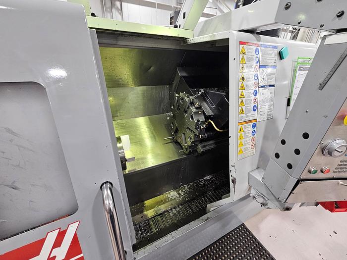 Used 2007 Haas SL-20 Chucker with C Axis, Milling/Drilling Capability, Chip Conveyor, Tool Presetter, 8" Chuck
