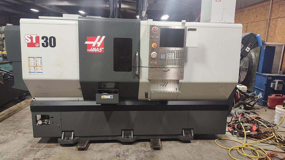 Used 2015 Haas ST-30 Chucker with Haas Servo Bar 300 Barfeed, Chip Conveyor, Parts Catcher, 10" Chuck, 3" Bar Capacity