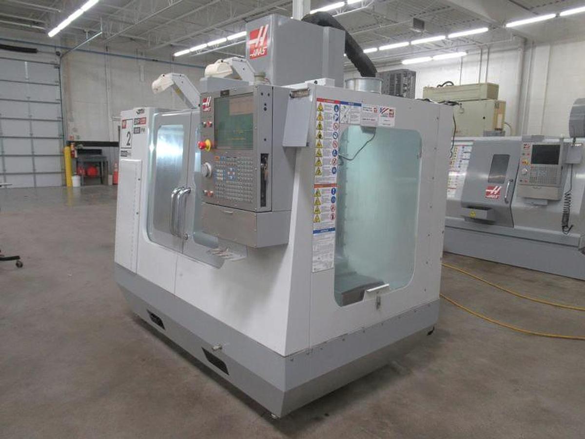 Used 2009 Haas VF2YT with Extended Y Axis Travel, Chip Auger, Rigid Tapping, 2 Spd Gearbox, 7500 RPM, 20 ATC