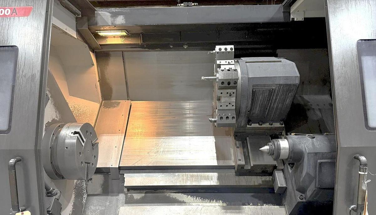 Used 2013 Doosan Puma 700A with 18" Hyd. Chuck, 6.5" Bar Capacity, 63" cc, Tailstock, Chip Conveyor, Tool Presetter, Fanuc 32i Cntrl