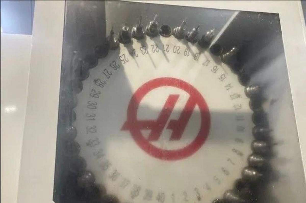 Used 2018 Haas UMC-750 5 Axis Universal Machining Center, 40 ATC, Probing, 1000 PSI CTS, Conveyor