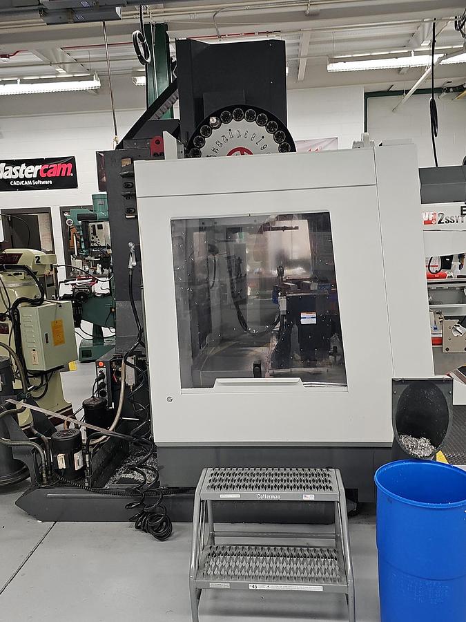 Used 2013 Haas VF-4SS w/Wired for 4th/5th axis, Remote Jog Handle, WIPS Renishaw Tool & Part Probe, Programmable Coolant Nozzle