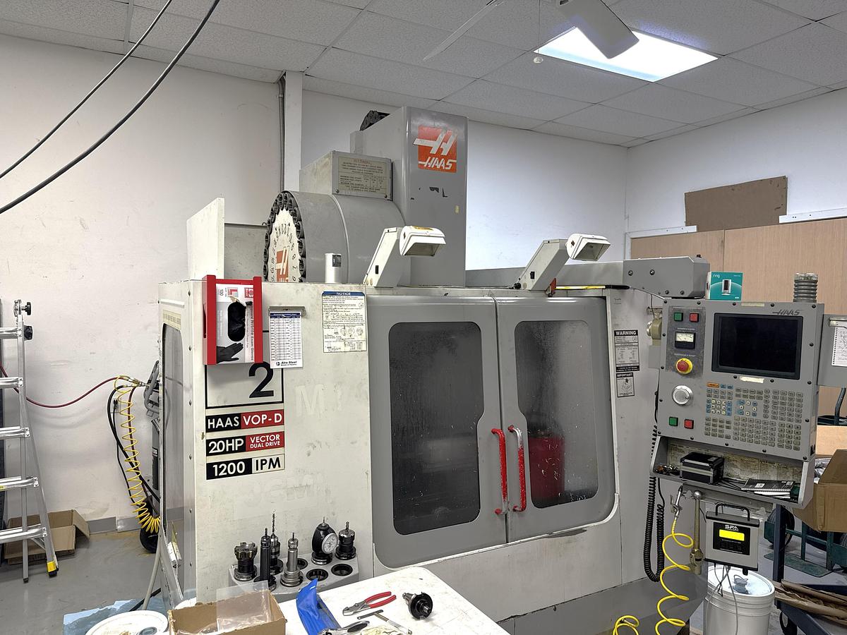 Used 2002 Haas VF2D with Haas Rotary Table, 24 Station Side Mount ATC, Chip Auger, Programmable Coolant