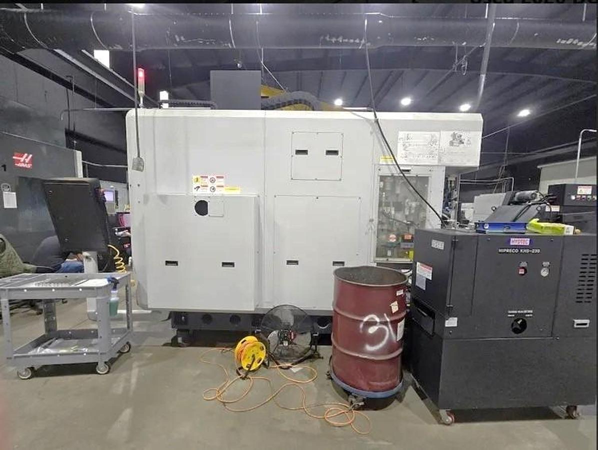 Used 2020 Doosan DVF 6500 5 Axis Trunnion VMC with 18,000 RPM, 60 ATC, Coolant Thru Spindle, Probing, Chip Conveyor