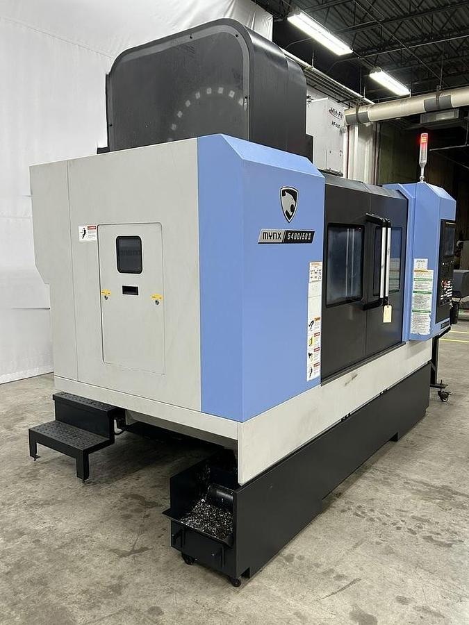 Used 2022 DN Solutions Mynx 5400/50 II with 4th Axis Drive, CAT50 Big Plus Spindle, Chip Conveyor, Mist Collector, Conversational