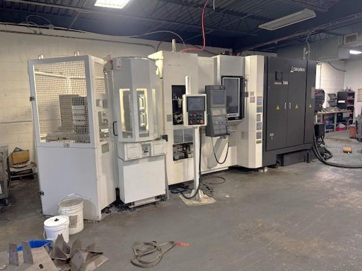 Used 2017 Okuma MB-4000H with 6 Station Rotary Pallet Changer, Full 4th Axis Rotary Tbl, 15k RPM, HSK63 Tpr., HPC, Probing, 64 Pos ATC