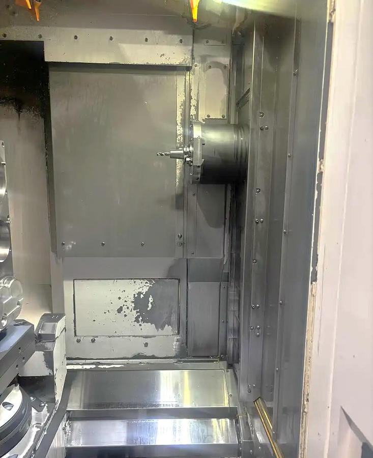 Used 2020 Okuma MB-4000H with 6 Pallet Changer, Full 4th Axis, Renishaw Probing, High Press. Coolant Thru Spindle, 146 Pos. ATC, Conveyor