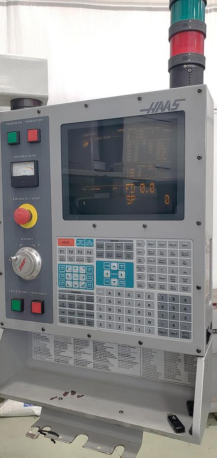 Used 2001 Haas VF4D with Haas HRT210 4th Axis Table, Tailstock, Auger, Prog. Coolant, Quick Code