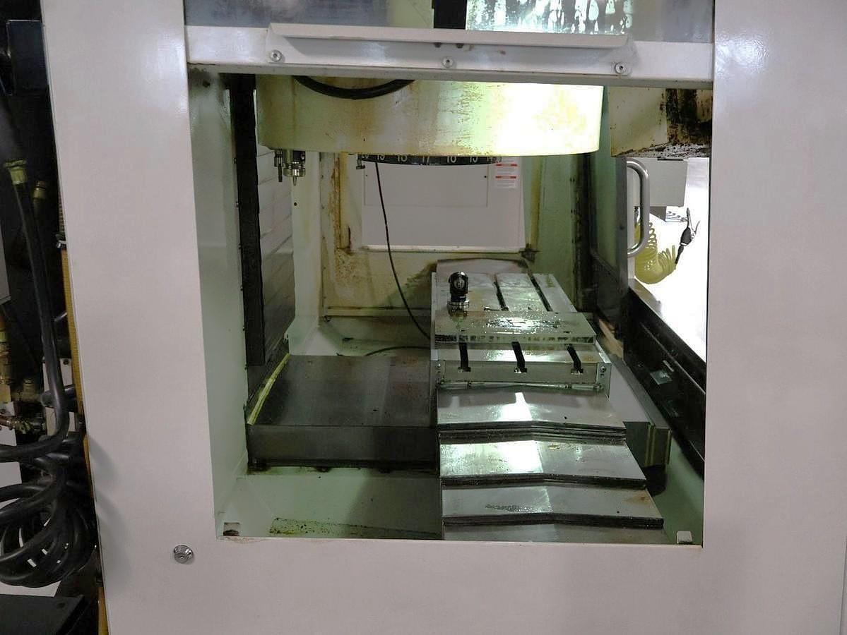 Used 2013 Haas VF2 with Probing, 4th Axis Drive, Chip Auger, 20 Station Carousel Style ATC