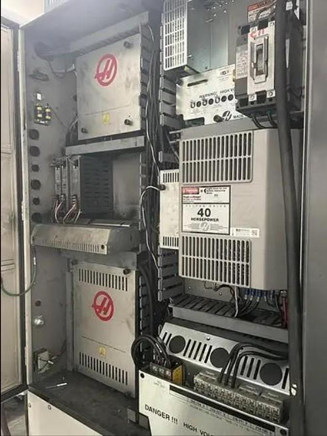 Used 2014 Haas VF5/40 XT with Extended 60" X Axis Travel, Chip Auger, Prog. Cool, 20 Station ATC, Rigid Tap