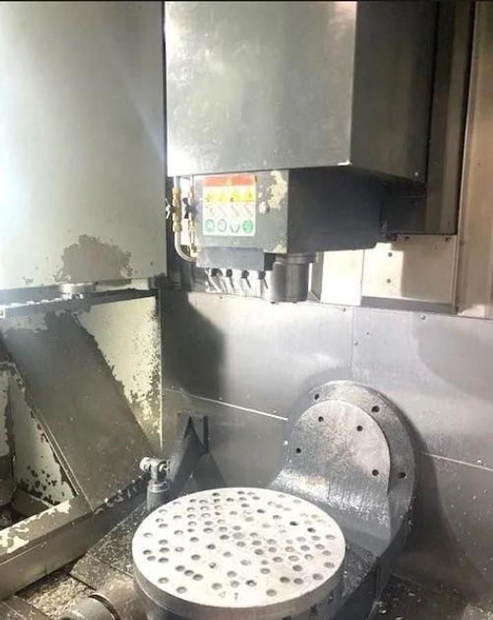 Used 2018 Haas UMC-750 5 Axis Universal Machining Center, 40 ATC, Probing, 1000 PSI CTS, Conveyor