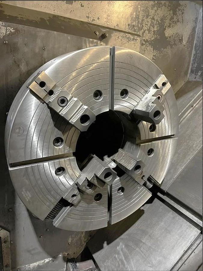 Used 2012 Chevalier FBL-530C with 12.59" Bore, 32" 4 Jaw Manual Front Chk, 28" Rear Air Chk, Tailstock, 118" cc, 500 RPM, Conveyor 