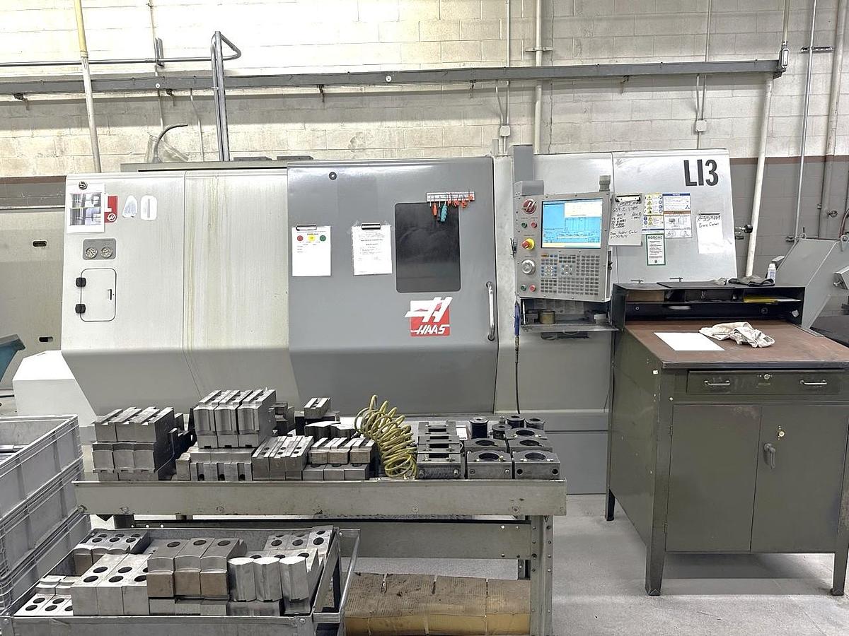 Used 2011 Haas SL-40T with 15" Hyd. Chuck, Tool Presetter, Tailstock, Chip Conveyor, Geared Head, Block Style Turret, 7700 Spindle Hrs.