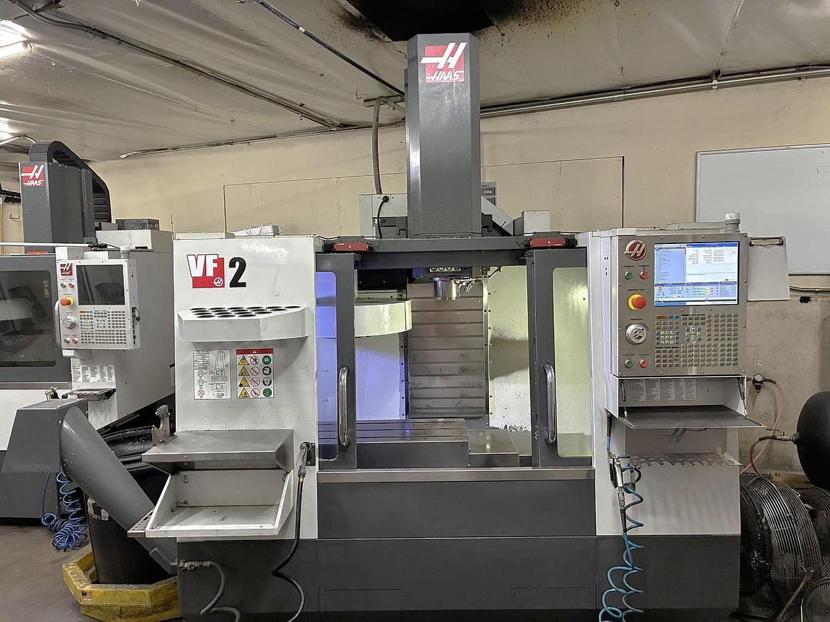 Used 2017 Haas VF2 with Chip Auger, Rigid Tapping, 8100 RPM, 20 Station Umbrella ATC, ONLY 3,429 Feed Cutting Hours !!