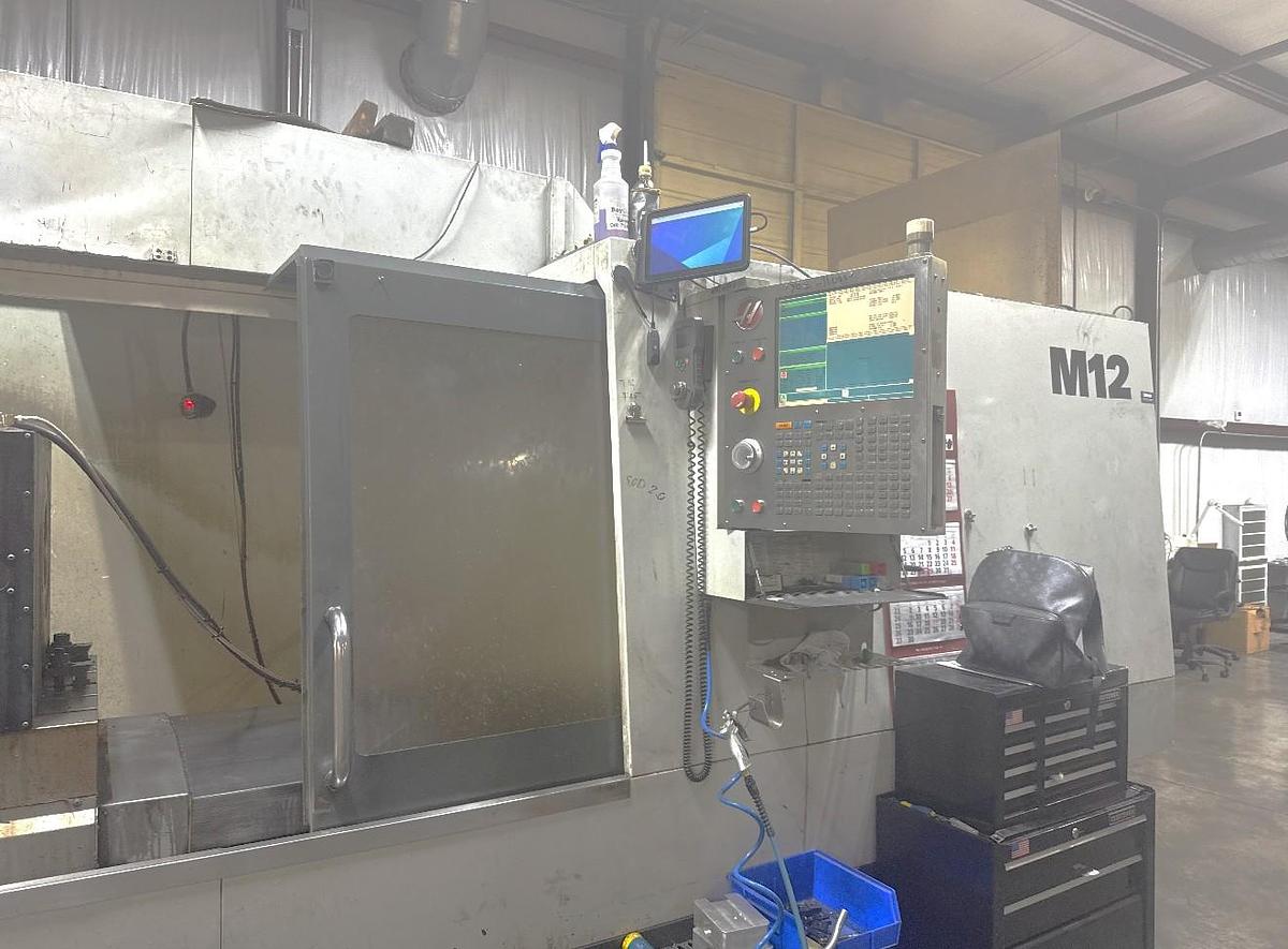 Used 2014 Haas VF-12/50 with 30 Pos. Side Mounted ATC, Wired for 4th Axis, High Pressure Coolant Thru Spindle