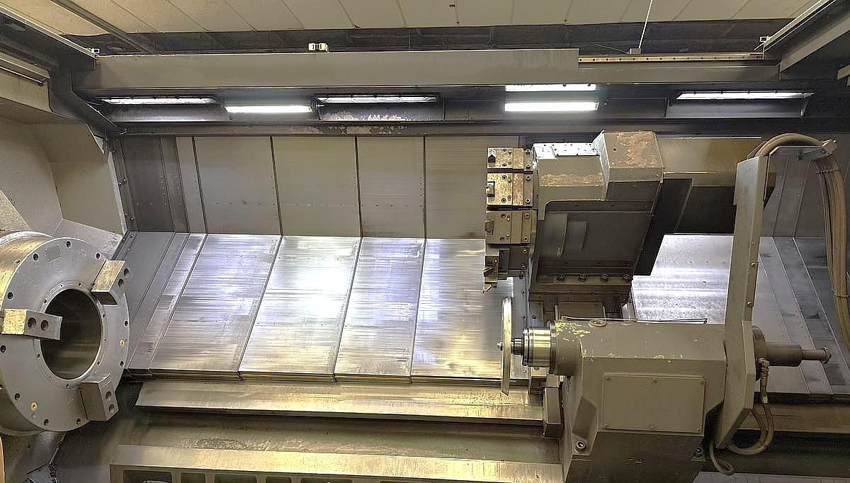 Used 2015 Doosan Puma 800LM with C Axis & Milling, 31.5" 3 Jaw Rohn Air Chk, 12.6" Bar Cap., 126" Turn Length, New RIP Steady Rest, Tailstock, Conveyor