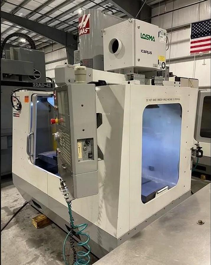 Used 2006 Haas VM-2 with Haas HRT210 4th Axis Table, Prog. Coolant, Remote Jog Handle, 24 Station Side Mount ATC, High Spd Machining