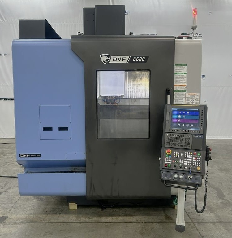 Used 2022 DN Solutions DVF 6500 5 Axis Trunnion VMC with 18,000 RPM, 60 ATC, Coolant Thru Spindle, Probing, Chip Conveyor