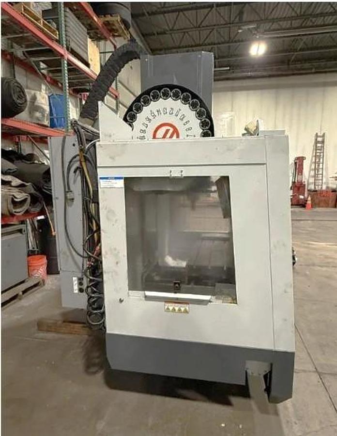 Used 2010 Haas VF2SS with 24 Station SMATC, 12,000 RPM, Remote Jog Handle, USB Port Interface, High Intensity Lighting