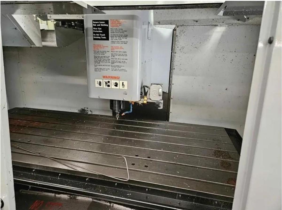 Used 2007 Haas VF9/40 with 10,000 RPM, 24 Station Side Mount ATC, CAT 40, 2 Speed Gearbox, Pcool, Auger