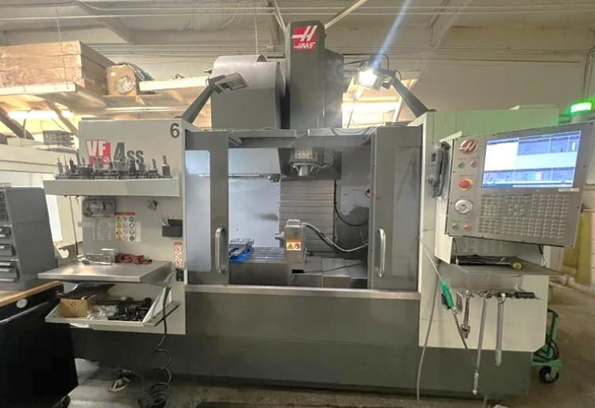 Used 2016 Haas VF4SS with Haas HRC-160 4th Axis Rotary Table, 40 Station ATC, Renishaw Probing, Pcool, 12,000 RPM