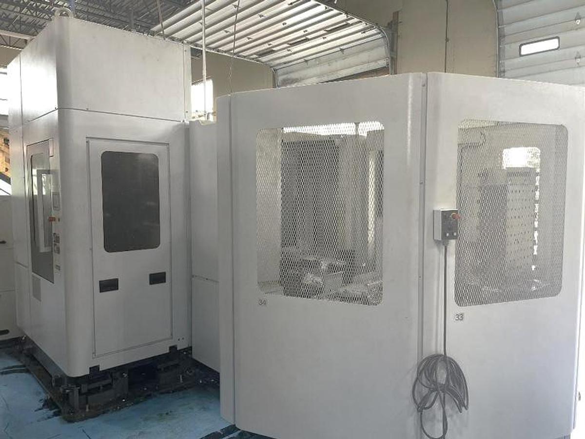 Used 2014 DMG Mori NHX 4000 with 5 Pallet Pool, Full 4th Axis Table, Tool Probe, 1000 PSI Cool Thru Spindle, 120 Station ATC, Conveyor