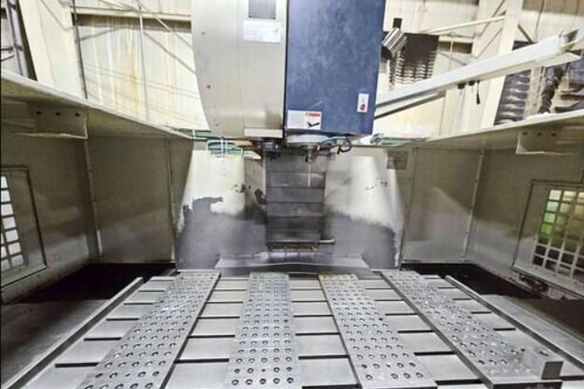 Used 2004 Takumi V-22 with Coolant Thru Spindle, Conveyor, 24 Pos. Side Mount ATC, RJH, Boxed Ways, Fanuc Control