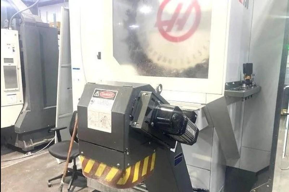 Used 2018 Haas UMC-750 5 Axis Universal Machining Center, 40 ATC, Probing, 1000 PSI CTS, Conveyor