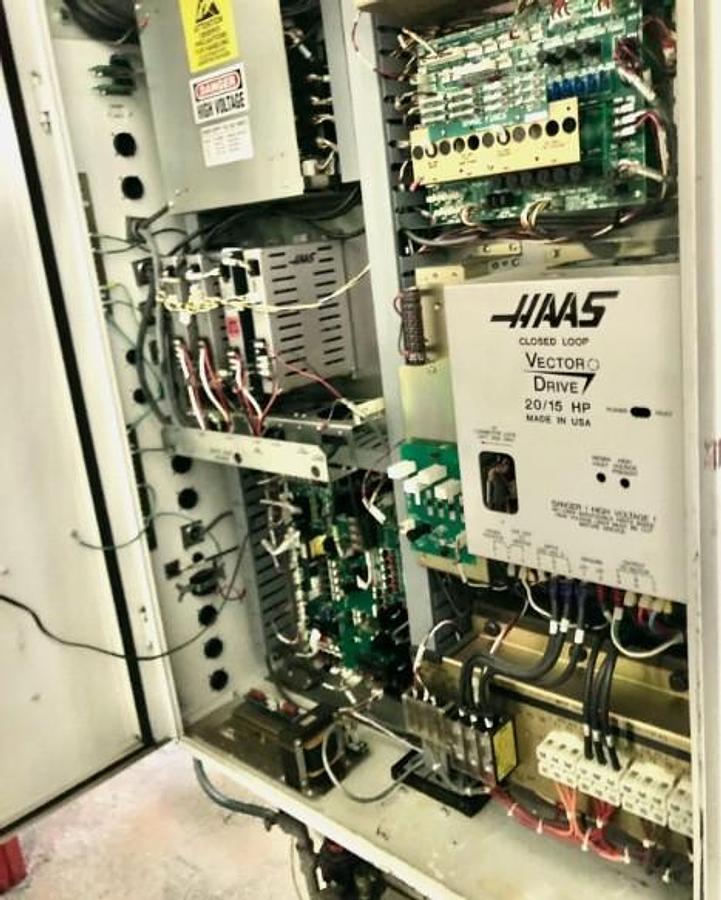 Used 2004 Haas VF2D with 4th Axis Drive, 24 Station Side Mount ATC, Chip uger, Programmable Coolant