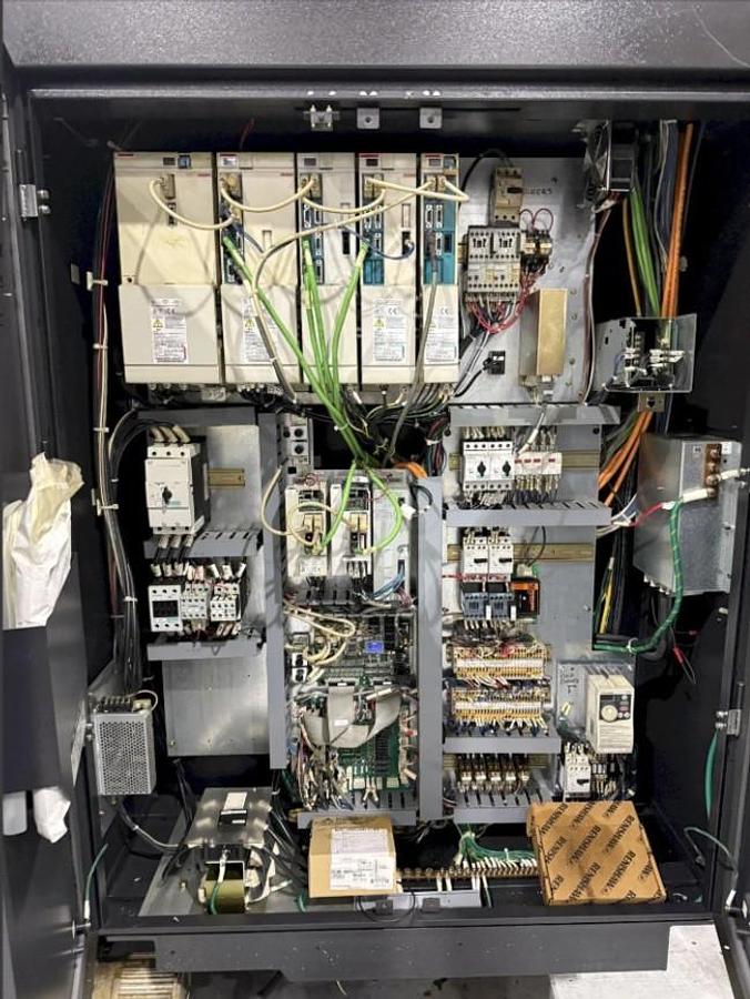 Used 2006 Mazak Nexus VCN 510C with Nikken 4th Axis, Coolant Thru Spindle, Tool Probing, Chip Conveyor